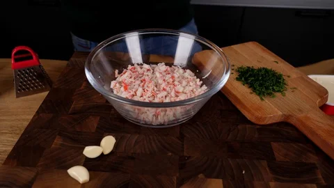 A man prepares delicious snacks Stock Footage 128636729