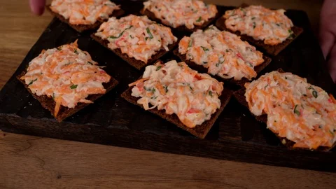 A man prepares delicious snacks Stock Footage 128636827