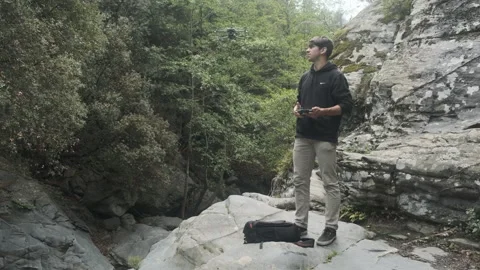 Man prepares a drone for a flight. DJI Air 2s. Launching the drone Stock Footage 243417908