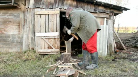 Man prepares firewood Stock Footage 10580345
