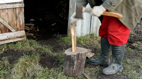 Man prepares firewood Video stock 10580433