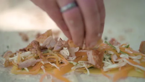 Man prepares shawarma outdoors. Stock Footage 142189911