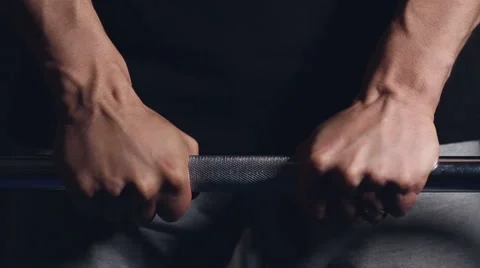 Man Preparing and Lifting Heavy Barbell Stock Footage 68986026