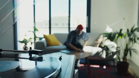 Man preparing and playing a vinyl record at home Stock Footage 307602687