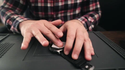 Man Preparing To Apply Protective Glass On Smartwatch Screen Stock Footage 341593071