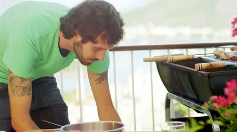 Man preparing authentic Brazilian BBQ Stockbeeldmateriaal 47347922