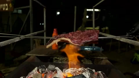 A man preparing BBQ. Flaming Barbecue Grill, Healthy eating concept Stock Footage 139479864