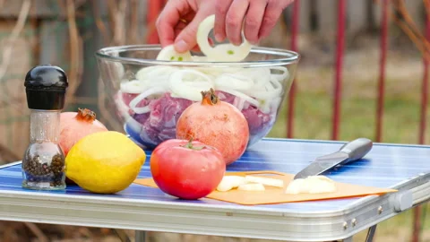 Man preparing bbq in nature Stock Footage 166746095