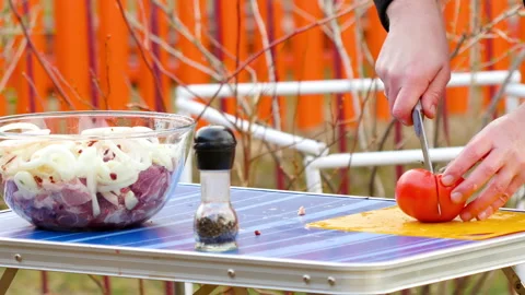Man preparing bbq in nature Stock Footage 167080728