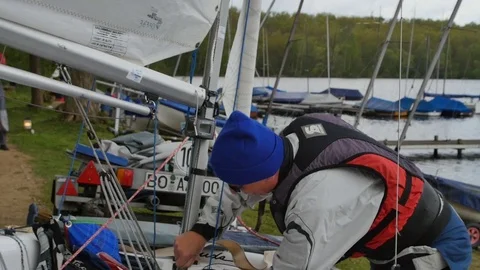 Man preparing boat to start for regatta Stock Footage 81047742