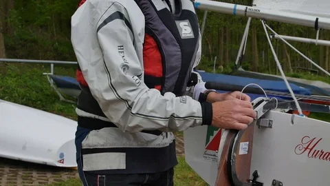 Man preparing boat to start for regatta Stock Footage 81048348