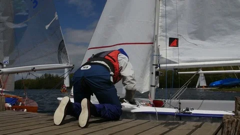 Man preparing boat to start for regatta Stock Footage 81049025