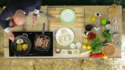 The man is preparing breakfast top view Stock Footage 74456886
