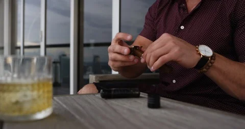 Man preparing cigar to smoke Stock Footage 116347320
