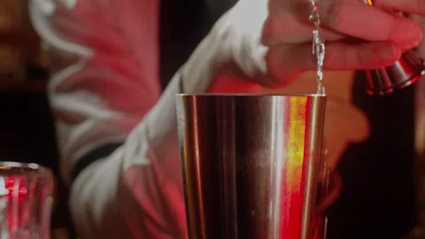 Man preparing a cocktail on a bar Stock Footage 255705089