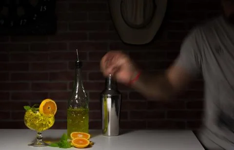 Man preparing cocktail with orange Stock Photos