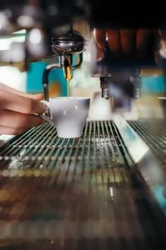 Man Preparing Coffee at Coffee Machine Stock Photos