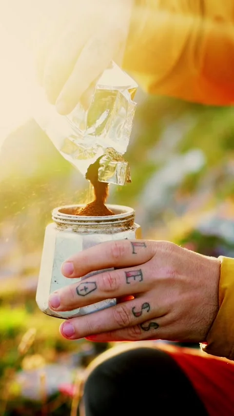 Man preparing coffee on the mountain Stock Footage 292827033