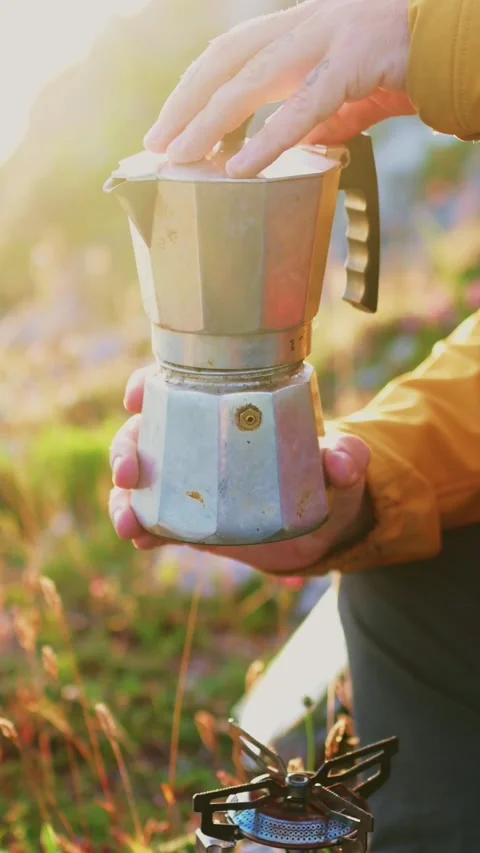 Man preparing coffee on the mountain Stock Footage 292827043