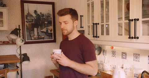 Man preparing Coffee Tea Kitchen Relaxed Perfect Morning at Home Vídeo Stock 195288547
