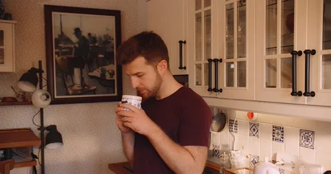 Man preparing Coffee Tea Kitchen Relaxed Perfect Morning at Home Vídeo Stock 195288549