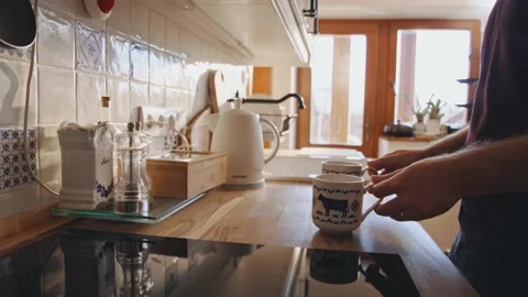 Man preparing Coffee Tea Kitchen Relaxed Perfect Morning at Home Video stock 195289059