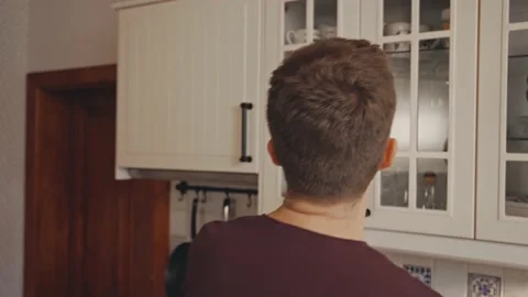 Man preparing Coffee Tea Kitchen Relaxed Perfect Morning at Home Video stock 195289066