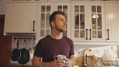 Man preparing Coffee Tea Kitchen Relaxed Perfect Morning at Home Stock-Footage 195289112