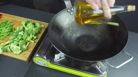Man preparing curry vegetables on the wok pan 스톡 동영상 59847428