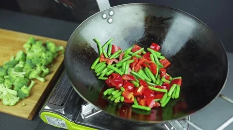 Man preparing curry vegetables on the wok pan 스톡 동영상 59847449
