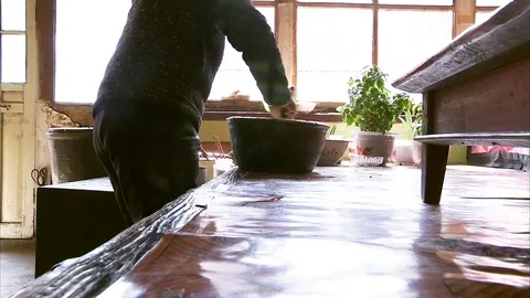 Man preparing dough in the bowl at kitchen Stock-Footage 88333222