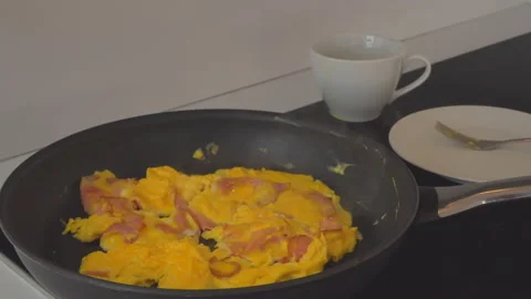 Man preparing eggs in kitchen Video stock 144955504