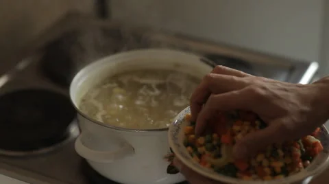 A man preparing food in the kitchen Stock Footage 59134431