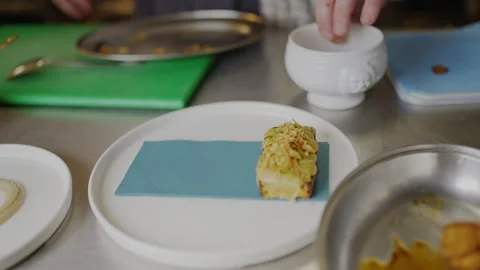 A man is preparing food in a kitchen Stock Footage 306577135