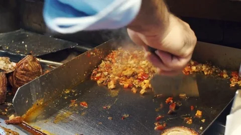 Man preparing Kokorec (Kokoretsi) Stock Footage 81730779