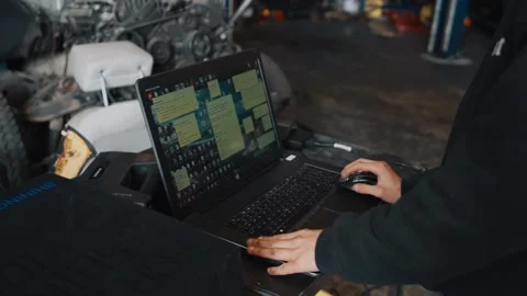 Man Preparing a Laptop to 3D Scan a Mazda RX7 Stock Footage 132361569