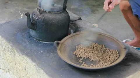 Man preparing luwak coffe in Bali Island Stock Footage 32284963