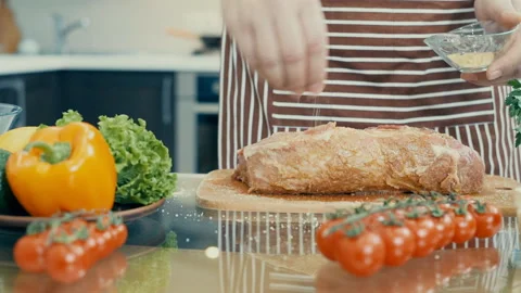 Man preparing meat in the kitchen . 動画素材 85791005