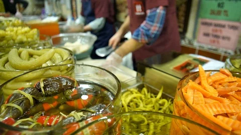 A Man Preparing Mix Pickled Vegetables in a Pickle Shop in Istanbul Stock Footage 126729540