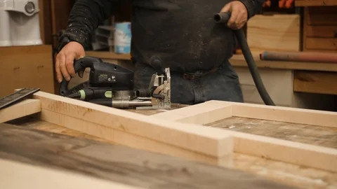 Man preparing morticer machine tool in workshop Stock Footage 102045439
