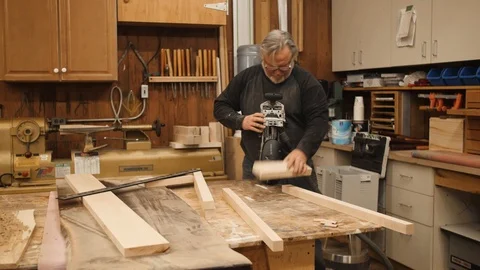 Man preparing morticer machine tool in workshop Stock Footage 102045444