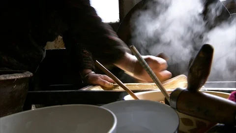 Man preparing noodle soup in the kitchen Stock Footage 88333534