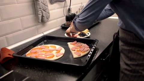 Man preparing pizza in the kitchen at home. ingredients Stock Footage 72260136