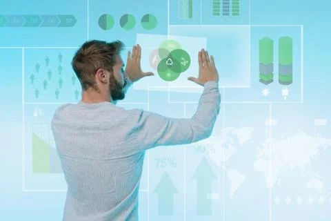 Man preparing presentation on graphical screen, rear view Stock Photos