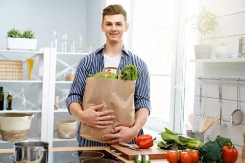 Man is preparing the proper meal Stock Photos