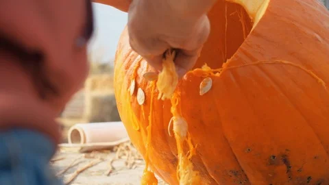 Man preparing a pumpkin for halloween 스톡 동영상 118917596