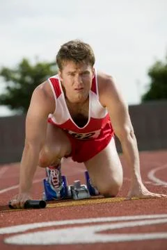 Man Preparing For Relay Race Stock Photos