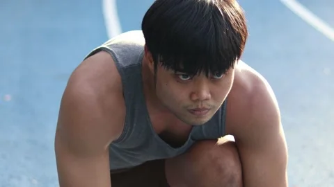 Man is preparing to run in the park in summer, healthy lifestyle. Stock Footage 156964531