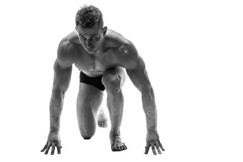 Man preparing for running. silhouette. isolate on white. Black and white photo Stock Photos