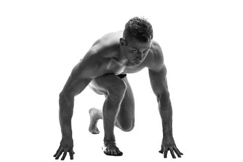 Man preparing for running. silhouette. isolate on white. Black and white photo Stock Photos